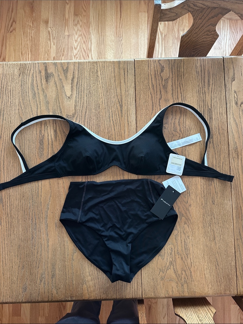 Fabletics Black Two-Piece Bikini Set. Top is a LARGE. Bottom is a size MEDIUM.